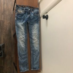 Size 26 mid rise skinny Shania Rock Revivals